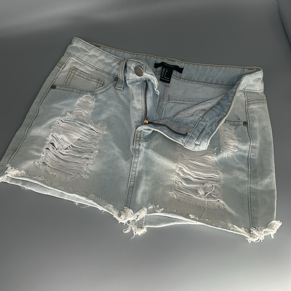 Forever 21 Women's Small Pale/Light Blue stretch denim Mini Skirt w/ ripped look